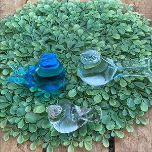 Birds made of glass, selling as a bundle.